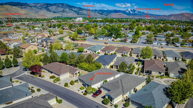 1230 Quail Run Dr, Carson City, NV 89701 - aerial view of residential area with a mountainous background