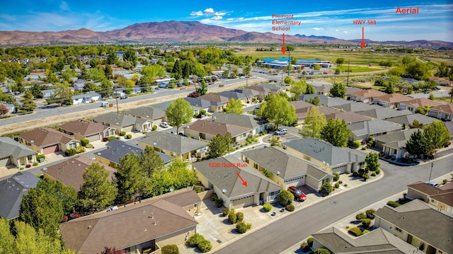 1230 Quail Run Dr, Carson City, NV 89701 - aerial view of residential area featuring a mountain backdrop