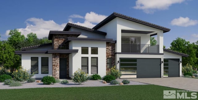 modern home with stone siding, stucco siding, a balcony, and driveway