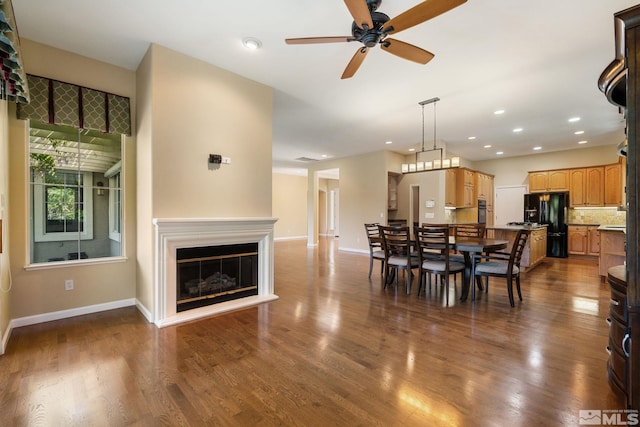 1745 Hunter Creek Rd, Reno, NV 89519 - dining space with baseboards, a ceiling fan, recessed lighting, and wood finished floors