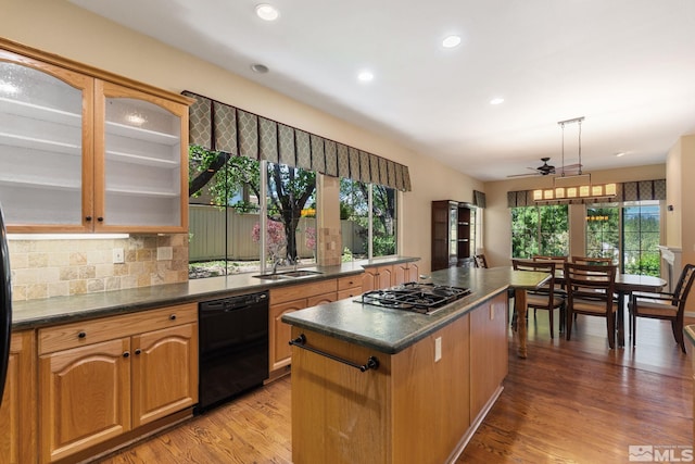1745 Hunter Creek Rd, Reno, NV 89519 - kitchen with dishwasher, stainless steel gas cooktop, healthy amount of natural light, dark countertops, and recessed lighting