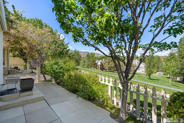 1745 Hunter Creek Rd, Reno, NV 89519 - view of patio / terrace featuring fence and a mountain view