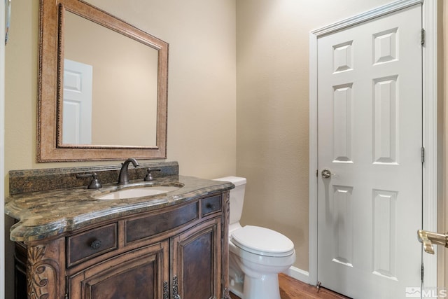 1745 Hunter Creek Rd, Reno, NV 89519 - half bath with toilet, vanity, and wood finished floors