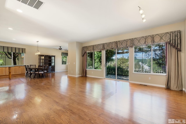 1745 Hunter Creek Rd, Reno, NV 89519 - living room with a ceiling fan, baseboards, light wood-style flooring, and recessed lighting