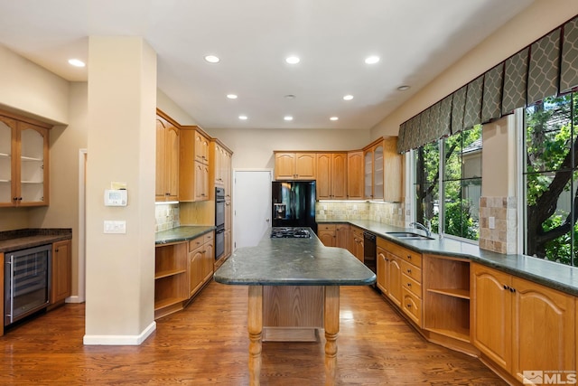 1745 Hunter Creek Rd, Reno, NV 89519 - kitchen featuring open shelves, wine cooler, black appliances, a sink, and recessed lighting