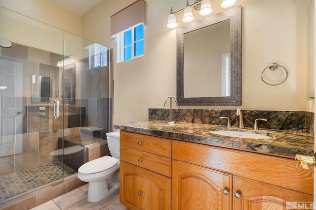 1745 Hunter Creek Rd, Reno, NV 89519 - bathroom with toilet, tile patterned flooring, a stall shower, and vanity