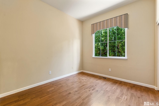 1745 Hunter Creek Rd, Reno, NV 89519 - unfurnished room featuring baseboards and wood finished floors