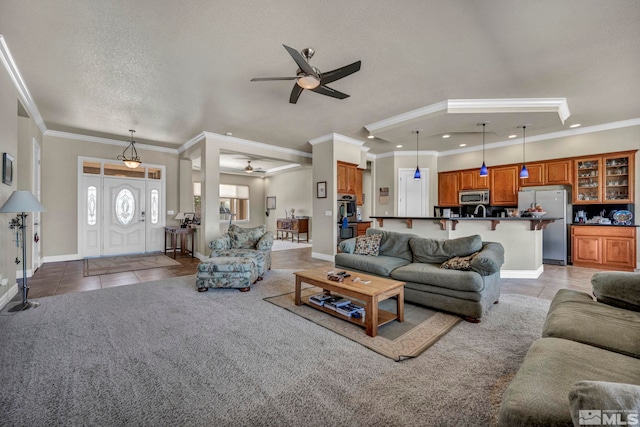 2825 N Fork Ln, Minden, NV 89423 - living area featuring a ceiling fan, light tile patterned flooring, ornamental molding, baseboards, and recessed lighting