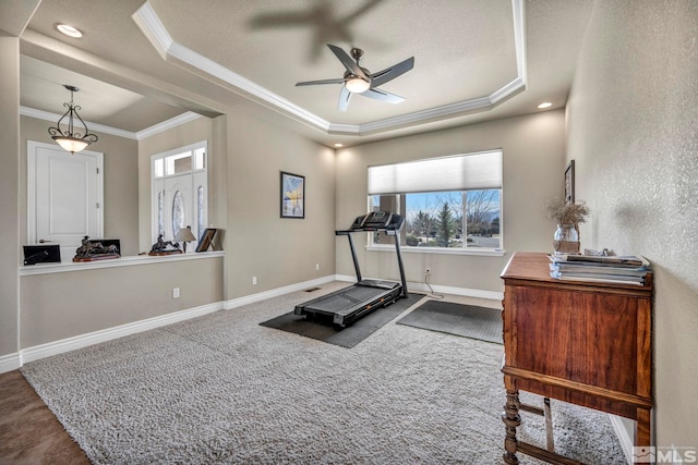 2825 N Fork Ln, Minden, NV 89423 - workout area featuring a raised ceiling, ceiling fan, crown molding, carpet flooring, and baseboards