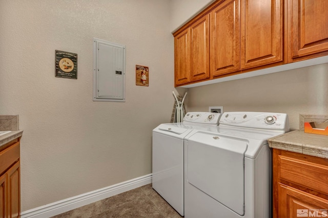 2825 N Fork Ln, Minden, NV 89423 - laundry room featuring electric panel, cabinet space, separate washer and dryer, baseboards, and light tile patterned floors