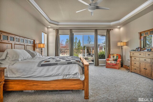 2825 N Fork Ln, Minden, NV 89423 - carpeted bedroom with a raised ceiling, crown molding, ceiling fan, and access to outside