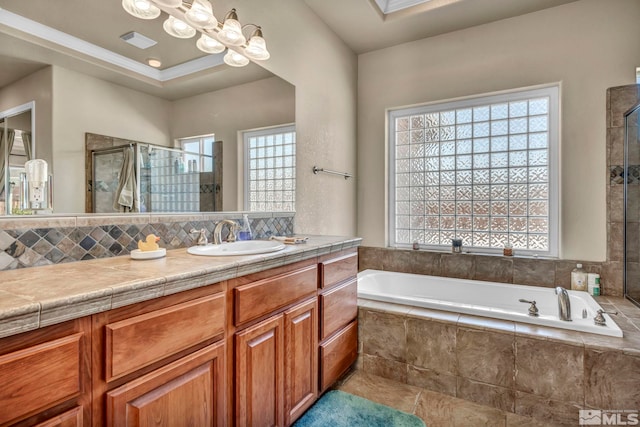 2825 N Fork Ln, Minden, NV 89423 - bathroom with a stall shower, a garden tub, vanity, and tasteful backsplash