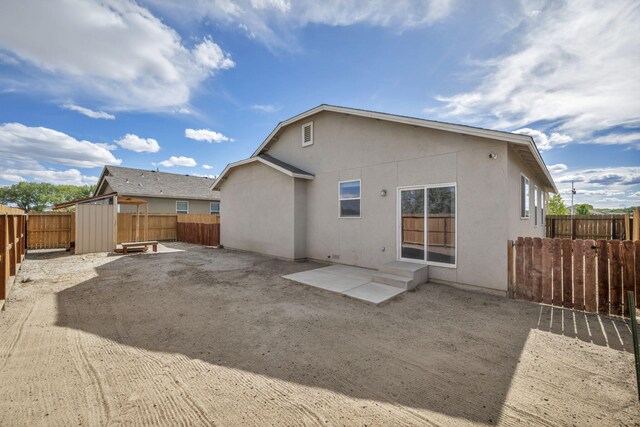1282 Onda Verde Dr, Fallon, NV 89406 - rear view of property featuring a patio, a fenced backyard, and stucco siding