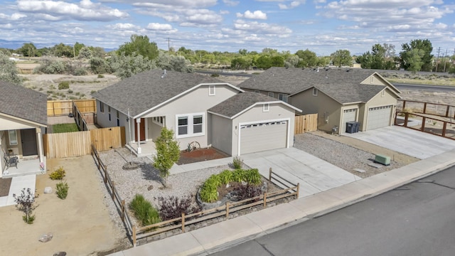 1282 Onda Verde Dr, Fallon, NV 89406 - single story home with concrete driveway, an attached garage, fence, stucco siding, and a gate