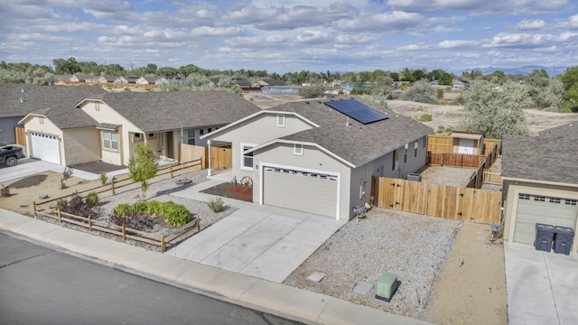 1282 Onda Verde Dr, Fallon, NV 89406 - ranch-style house featuring a gate, fence, stucco siding, and solar panels