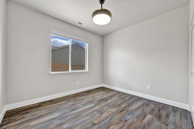 1282 Onda Verde Dr, Fallon, NV 89406 - spare room featuring dark wood-style floors and baseboards