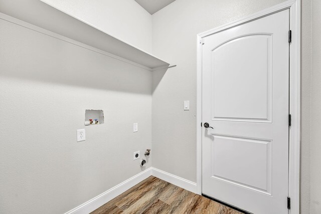 1282 Onda Verde Dr, Fallon, NV 89406 - clothes washing area featuring wood finished floors, hookup for a washing machine, baseboards, and electric dryer hookup