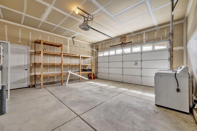 1282 Onda Verde Dr, Fallon, NV 89406 - garage featuring a garage door opener and washer / dryer