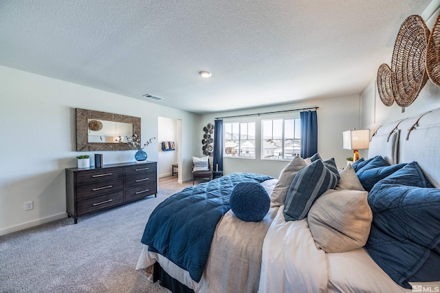 7593 Apex Pl Lot # 109, Reno, NV 89506 - bedroom with light colored carpet, a textured ceiling, and baseboards
