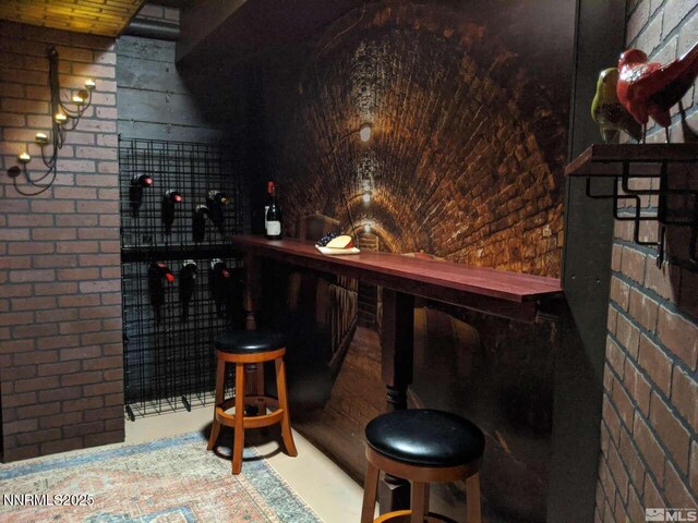 996 Tyner Way, Incline Village, NV 89451 - wine area featuring brick wall and finished concrete flooring