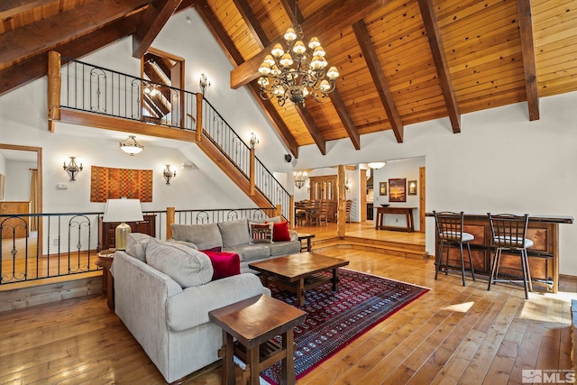 671 14th Green Dr, Incline Village, NV 89451 - living area with a chandelier, wood-type flooring, wood ceiling, high vaulted ceiling, and beamed ceiling