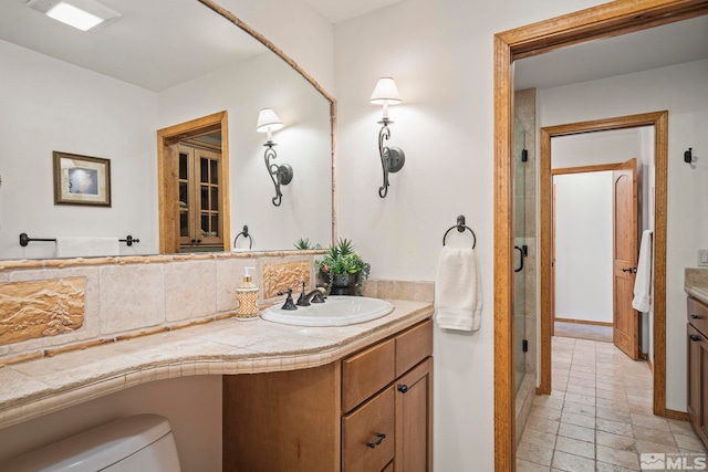 671 14th Green Dr, Incline Village, NV 89451 - bathroom featuring vanity, decorative backsplash, and baseboards