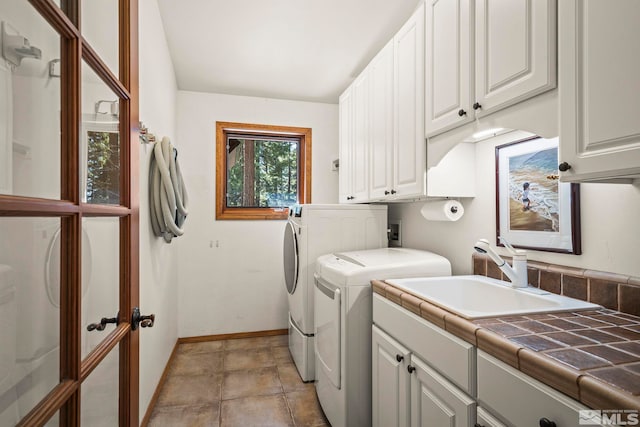 671 14th Green Dr, Incline Village, NV 89451 - laundry room with cabinet space, washing machine and clothes dryer, and baseboards