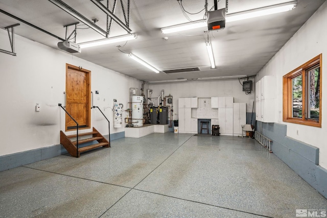 671 14th Green Dr, Incline Village, NV 89451 - garage featuring a garage door opener and water heater