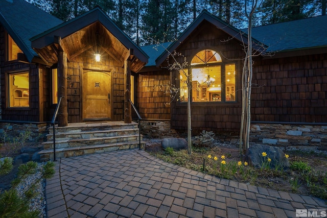 671 14th Green Dr, Incline Village, NV 89451 - property entrance featuring a shingled roof