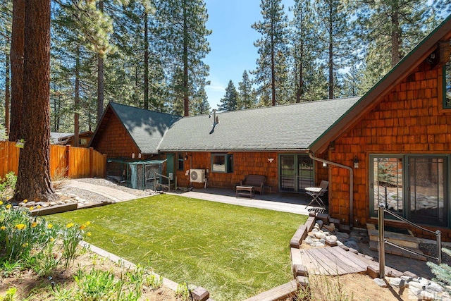 671 14th Green Dr, Incline Village, NV 89451 - back of property featuring roof with shingles and a patio