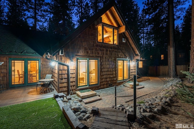 671 14th Green Dr, Incline Village, NV 89451 - back of property featuring a deck, french doors, and fence