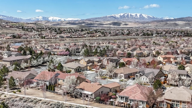 6650 Magical Dr, Sparks, NV 89436 - aerial perspective of suburban area with a mountainous background