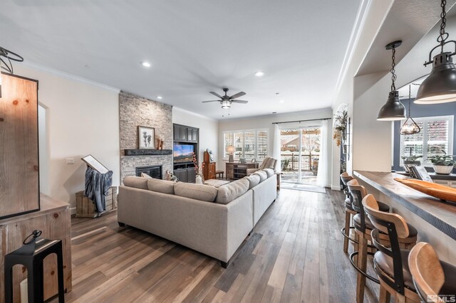 6650 Magical Dr, Sparks, NV 89436 - living area with ceiling fan, dark wood finished floors, plenty of natural light, recessed lighting, and crown molding