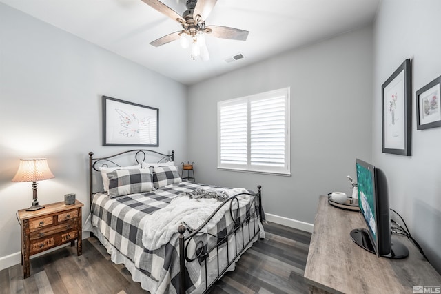 6650 Magical Dr, Sparks, NV 89436 - bedroom featuring baseboards, dark wood-type flooring, and a ceiling fan