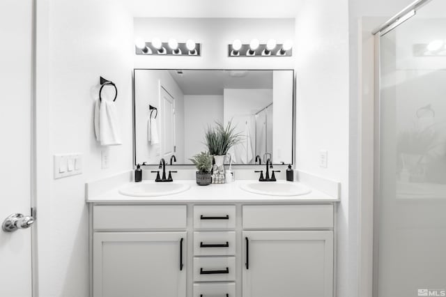 8855 Wolf Moon Dr, Reno, NV 89506 - full bathroom with a shower stall and double vanity