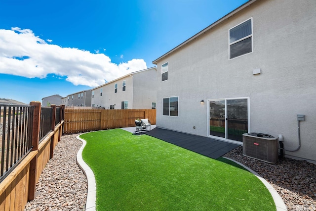 8855 Wolf Moon Dr, Reno, NV 89506 - view of yard featuring cooling unit and a patio