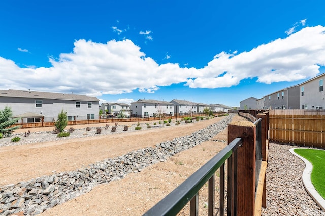 8855 Wolf Moon Dr, Reno, NV 89506 - view of yard with a residential view and fence