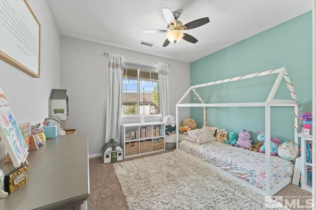 bedroom with carpet flooring, a ceiling fan, and baseboards