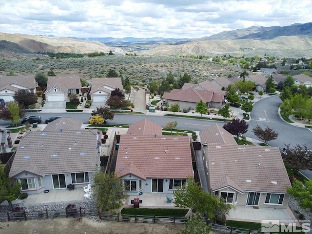 aerial perspective of suburban area with mountains