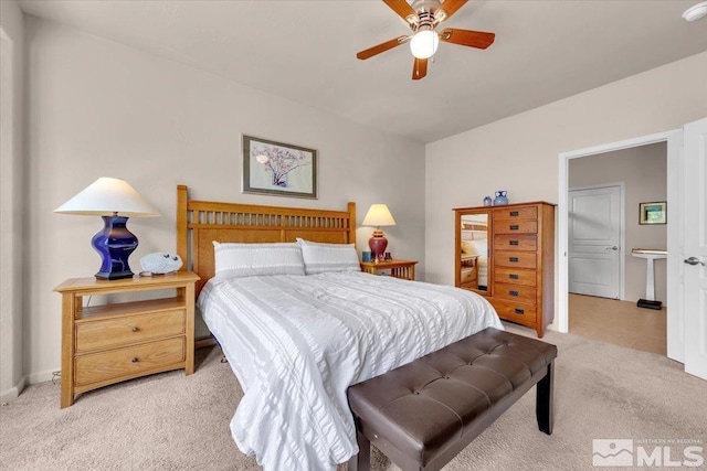 bedroom featuring carpet floors, a ceiling fan, and baseboards