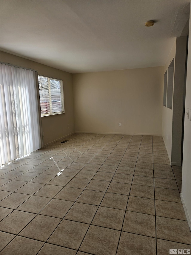9995 Brightridge, Reno, NV 89506 - unfurnished room with tile patterned flooring and a smoke detector
