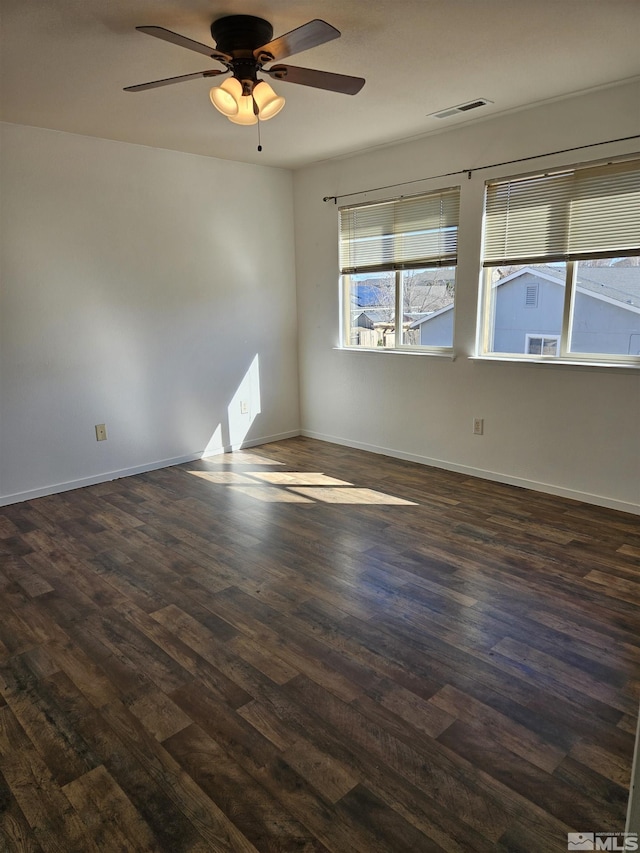 9995 Brightridge, Reno, NV 89506 - spare room with dark wood-type flooring, ceiling fan, and baseboards