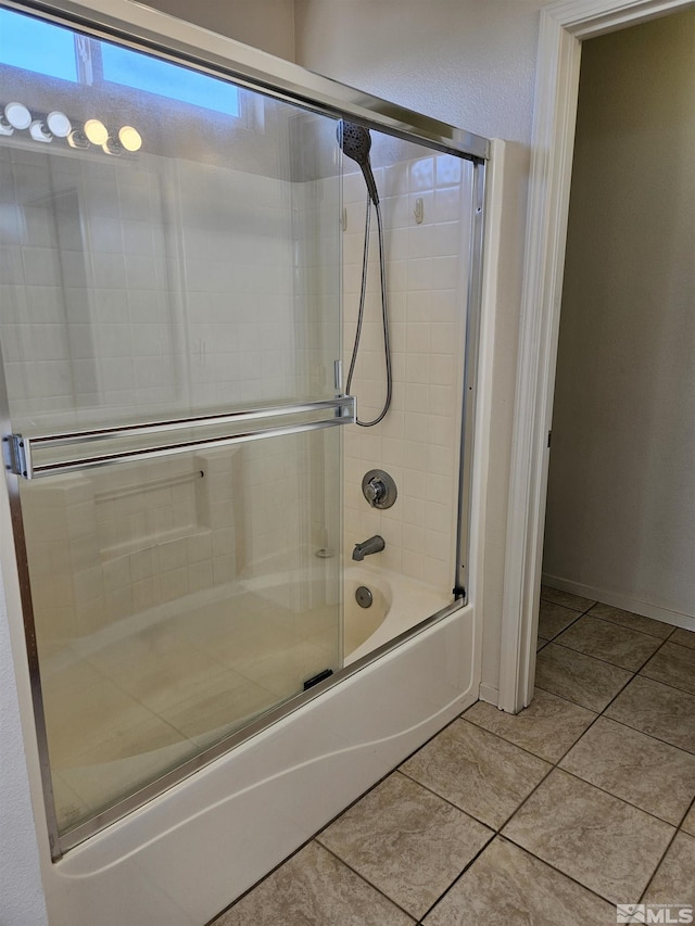 9995 Brightridge, Reno, NV 89506 - bathroom with tile patterned flooring and combined bath / shower with glass door