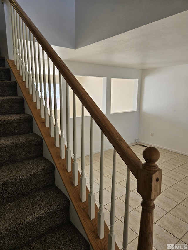 9995 Brightridge, Reno, NV 89506 - staircase featuring baseboards and tile patterned floors