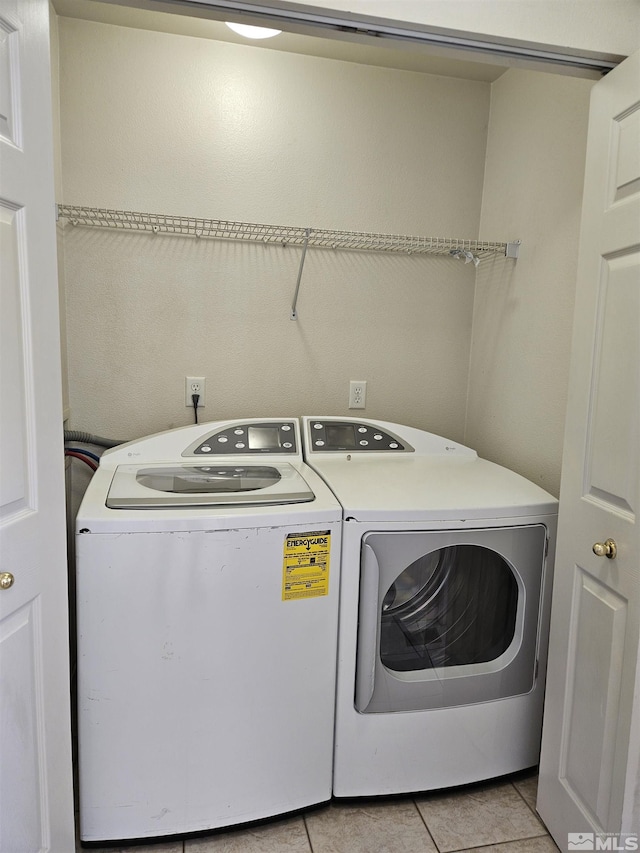 9995 Brightridge, Reno, NV 89506 - washroom with separate washer and dryer and light tile patterned floors