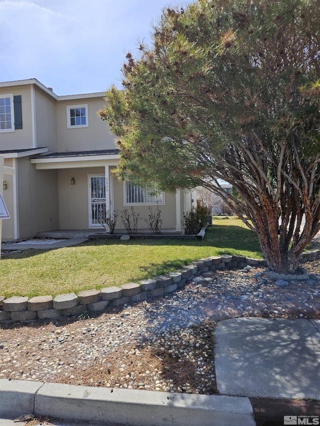9995 Brightridge, Reno, NV 89506 - view of front of home with a front lawn