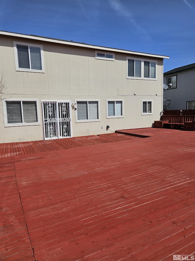 9995 Brightridge, Reno, NV 89506 - back of property with a wooden deck
