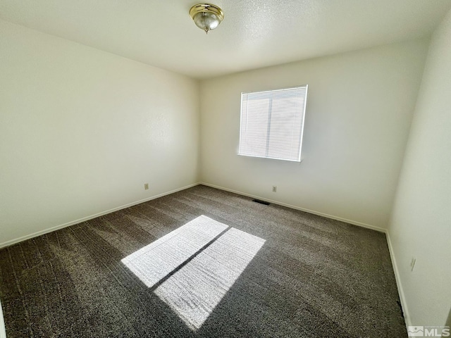1447 N Marion Russell, Gardnerville, NV 89410 - carpeted empty room featuring baseboards