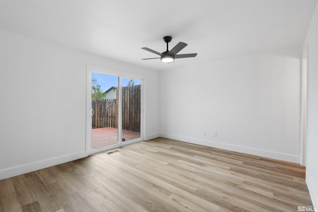 6798 Flower St, Reno, NV 89506 - empty room with light wood finished floors, baseboards, and a ceiling fan