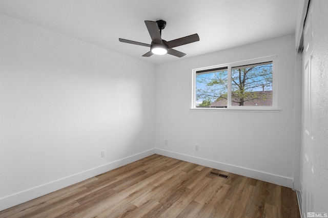 6798 Flower St, Reno, NV 89506 - spare room with light wood-style floors, baseboards, and a ceiling fan